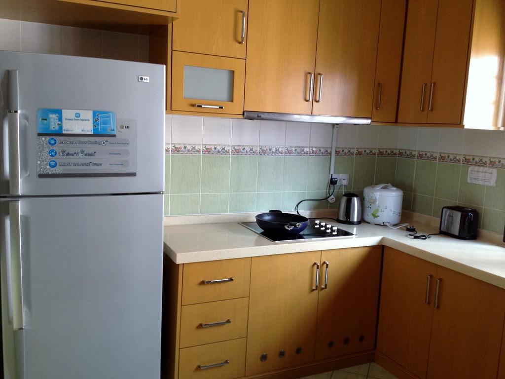 Homestay Marina Court Кота Кинабалу Стая снимка